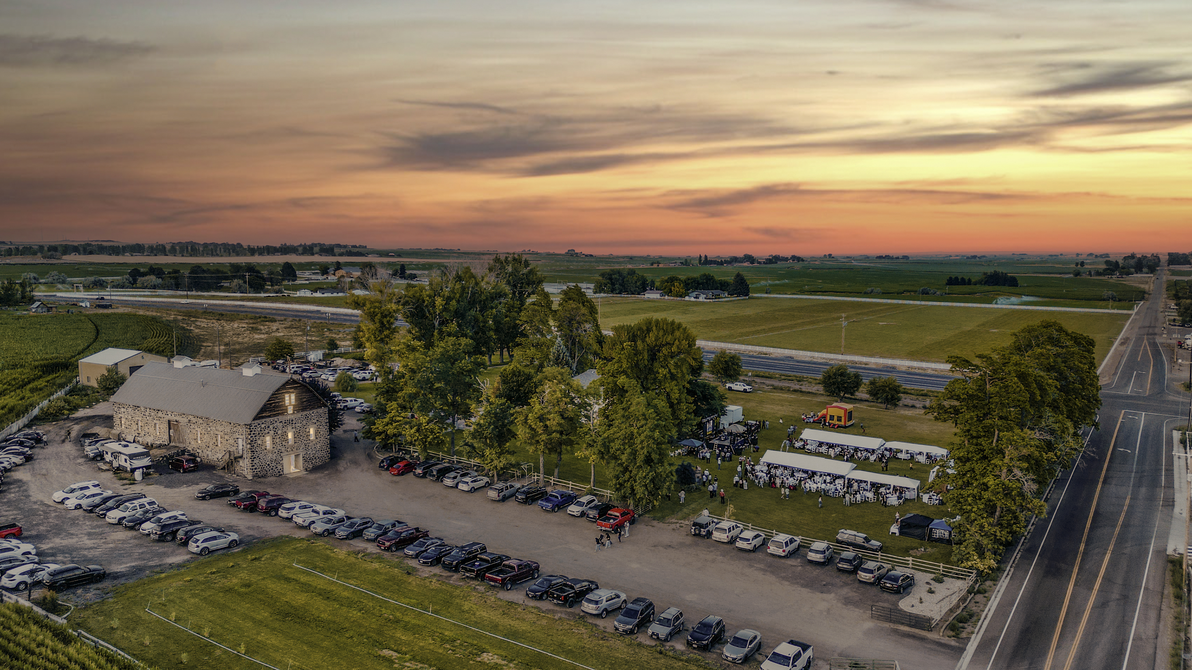 Wide aerial view of venue and surrounding land